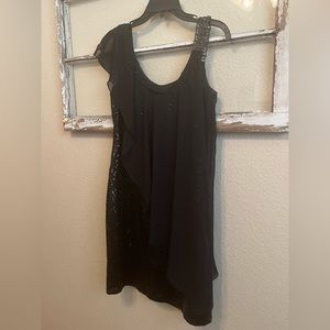 Black sequin cocktail dress. Cover mid-section, very flattering. Never worn.